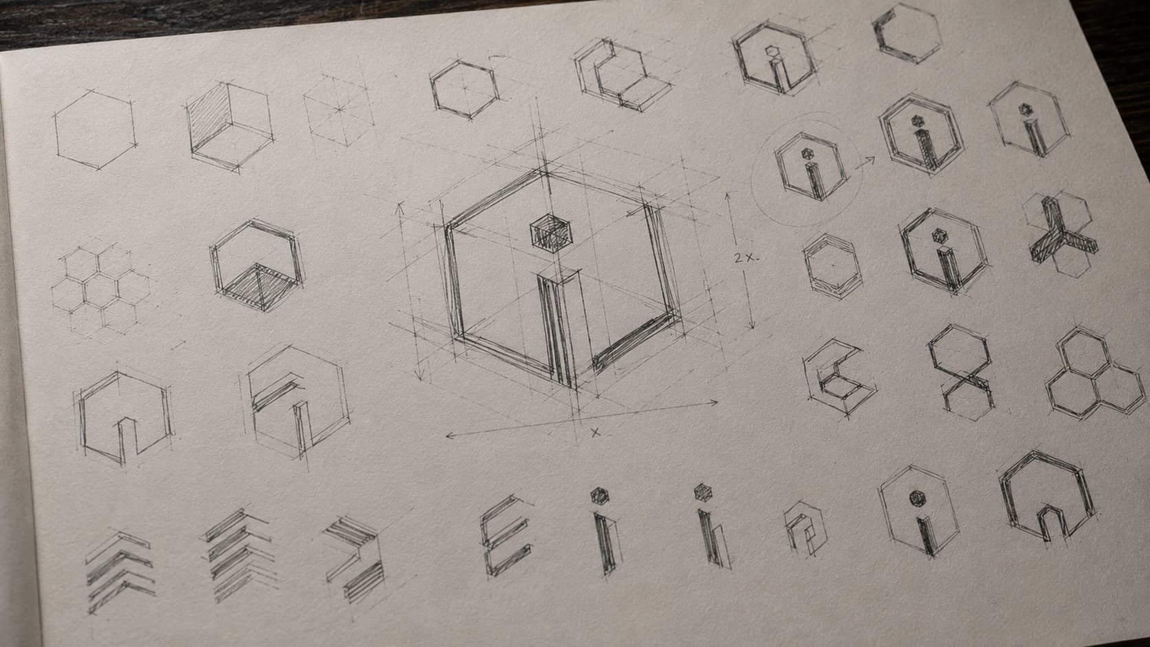 Geometric construction sketches for the hexagonal logo mark